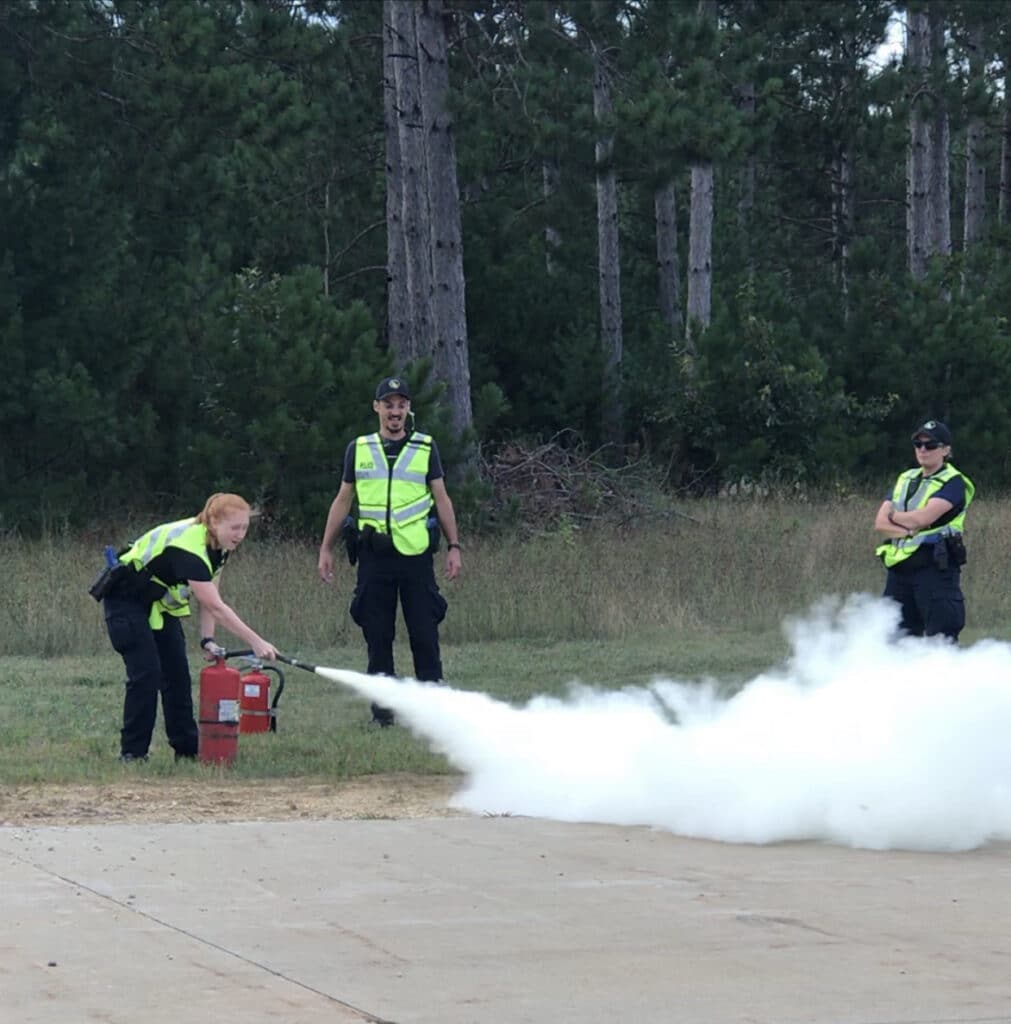 Fire extinguisher training with officers