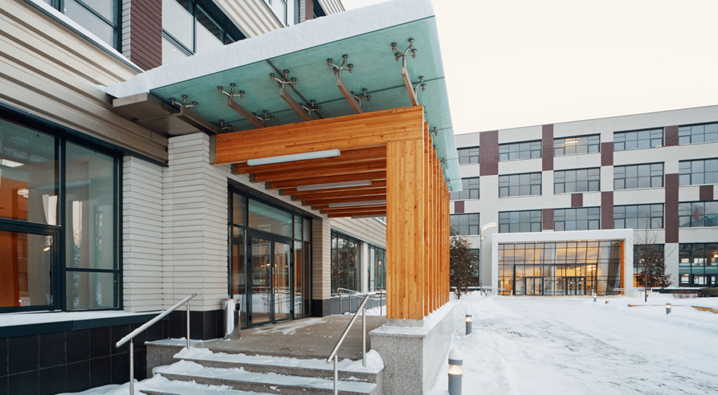 Modern building entrance with snow